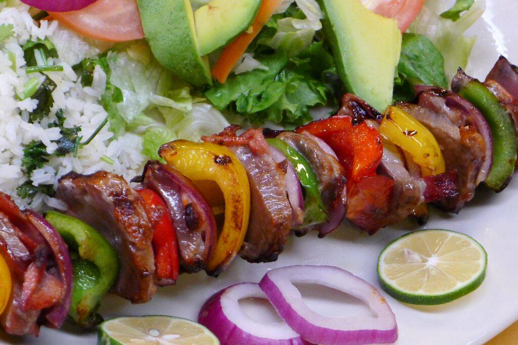 Kebab Beef Grilled on a Kebob with Vegetables like Bell Pepper and Onions